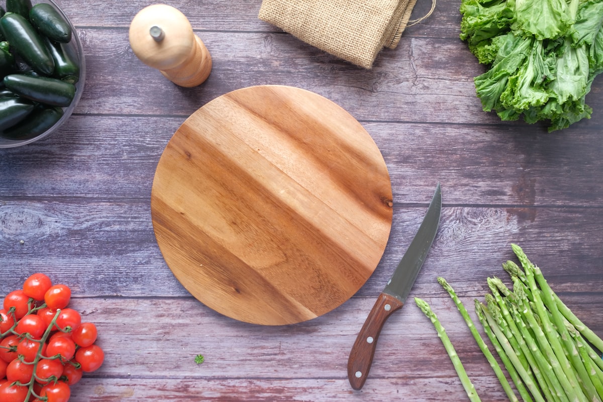 Fresh vegetables and ingredients on a wooden surface